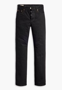 Jean noir à jambes droites avec braguette à boutons, cinq poches et détails de rivets en cuivre, posé à plat sur fond blanc.