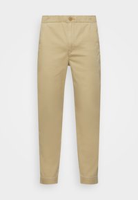 Khaki-Chinos mit geradem Bein, elastischem Bund und einem Frontknopfverschluss. Hergestellt aus einem glatten, leichten Baumwollmix.