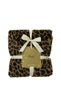 Manta borrosa con estampado de leopardo atada con una cinta color crema. Tamaño: 130x160 cm. La etiqueta muestra el nombre de la marca y el tipo de producto. Textura suave, material cálido.