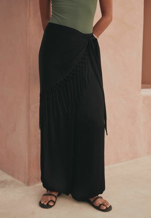 Next, REGULAR FIT - TASSEL SCARF BELTED BALLOON LEG TROUSERS  . - Pantalones - black