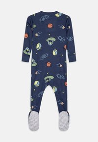 Navy cotton footed sleeper with long sleeves and a space-themed print featuring planets, stars, and cartoon aliens. Textured sole.