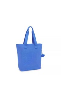 Borsa a tracolla blu con due spallacci, realizzata in tessuto testurizzato, con un ciondolo pom-pom attaccato di lato. Forma rettangolare.