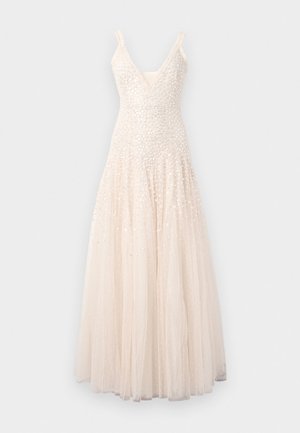 Beaded lange jurk in zacht beige, met een V-hals, dunne bandjes en een gelaagde tule rok met subtiele versieringen overal.