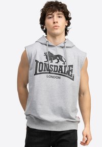 Gray sleeveless hoodie made of cotton blend, featuring a hood, black lion logo, and "Lonsdale London" text in bold lettering.