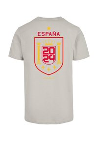 Grå bomull T-skjorte med et rødt og gult España-våpen med "2024" inni, en krone over, og tekst under i gult.