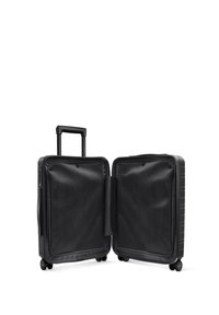 Black hard-shell suitcase with dual compartments, smooth texture, four swivel wheels, and a retractable handle. Interior mesh pockets visible.