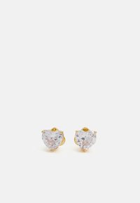 Gold-tone heart-shaped stud earrings featuring clear, faceted stones, secured with four prongs for a sparkling finish.