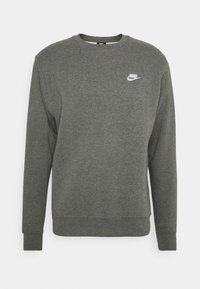 Grau Baumwoll-Sweatshirt mit Rundhalsausschnitt, langen Ärmeln, gerippten Bündchen und einem weißen Nike-Logo auf der linken Brust. Minimalistisches Design.