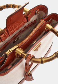 Guess ZABRY  pomarańczowy