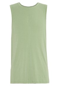 Ärmlös grön topp i mjuk bomull, med rund halslinning och subtila sömnadsdetaljer på baksidan för extra textur.
