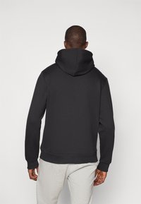 Champion GRAPHIC HOODIE - Hanorac - black