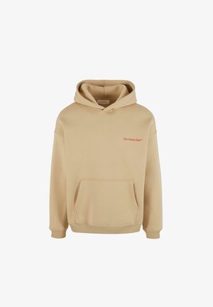 Béžová mikina s kapucňou vyrobená z mäkkej tkaniny, s prednou vreckom a textom "Slow Sunday Club" vyšitou červenou farbou.