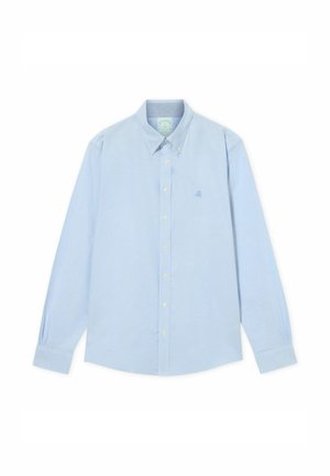 Světle modrá košile s dlouhým rukávem a límečkem, vyrobená z bavlny, s knoflíkov�ým zapínáním v přední části a vyšitým logem v modré barvě na levé části hrudi.