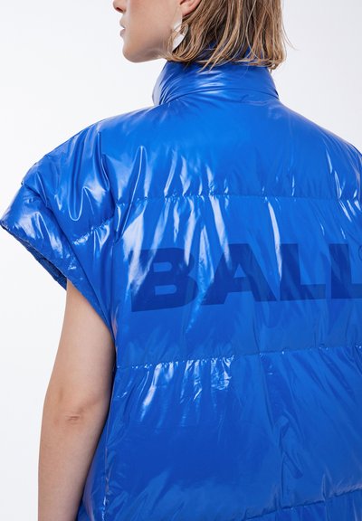 Blue puffer vest with a glossy finish, short sleeves, high collar, and large lettering "BALL" on the back. Smooth texture and padded design.