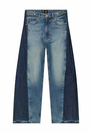 Light and dark denim wide-leg jeans featuring contrast paneling, a classic five-pocket design, and frayed hems. Button and zipper closure.