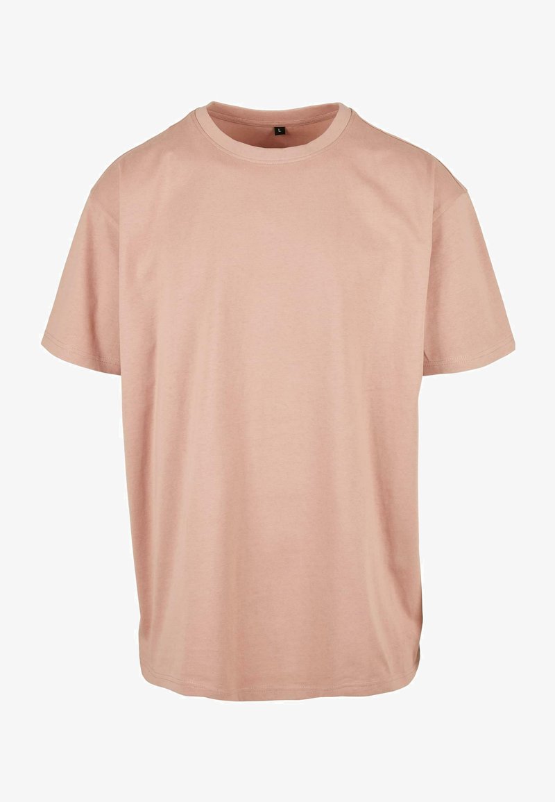 Roze katoenen T-shirt met korte mouwen, een ronde hals en een ontspannen pasvorm. Gladde textuur zonder zichtbare patronen of versieringen.