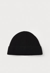 Black knitted beanie made from ribbed fabric. Features a rolled cuff and a rounded top. Texture appears soft and stretchy.