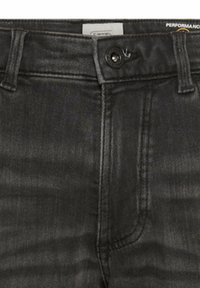 Zwarte denim jeans tailleband met knoopsluiting, riemlussen en zichtbare voorste stiksels.