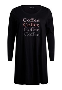 Maglietta nera a maniche lunghe con testo ripetuto "Caffè" in diverse tonalità di rosa e grigio. Realizzata in tessuto morbido con scollatura arrotondata.
