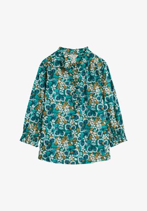 Dlouhý rukáv blůza v tyrkysové barvě s květinovým vzorem v bílé, zelené a oranžové. Obsahuje rýhovaný límec a nařasené manžety.