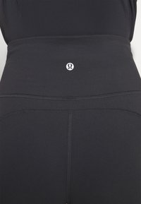 GROOVE SUPER-HIGH-RISE FLARED NULU - Punčochy - black