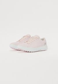 Light pink athletic shoes made of soft fabric with a white rubber sole, featuring round laces and a subtle logo on the side.