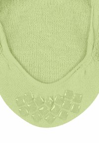 Chaussette vert clair avec un motif texturé près du orteil, présentant un design tricoté lisse et un poignet côtelé pour un confort et une élasticité supplémentaires.