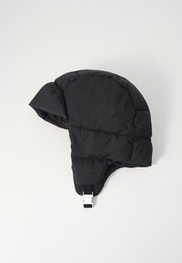 Black puffer hat with a structured shape, featuring a distinct folded design and a strap with a silver buckle at the bottom.