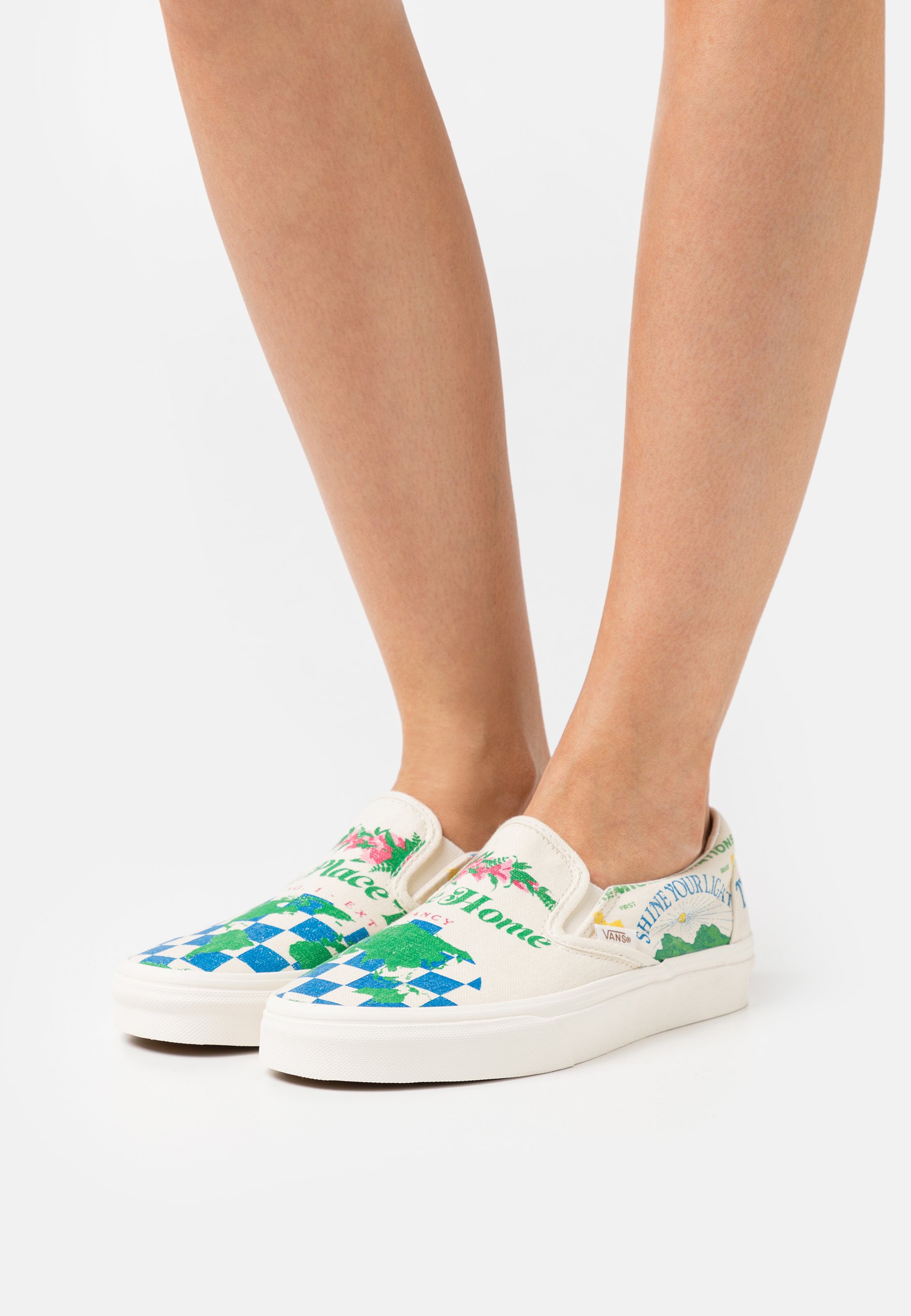 multi coloured slip on vans