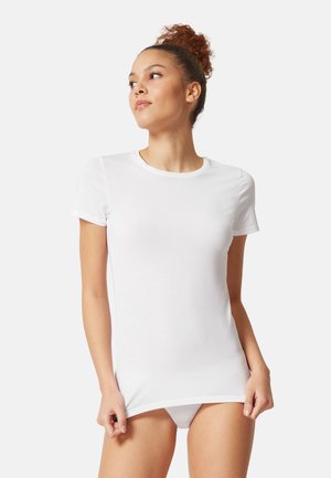 Witte T-shirt met korte mouwen gemaakt van glad katoenen stof, met een ronde halslijn en een aansluitend ontwerp.