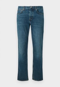 Džíny z modrého denimu se rovnými nohavicemi, pěti kapsami, zapínáním na knoflík a jemným vyblednutím na stehnech a kolenou.