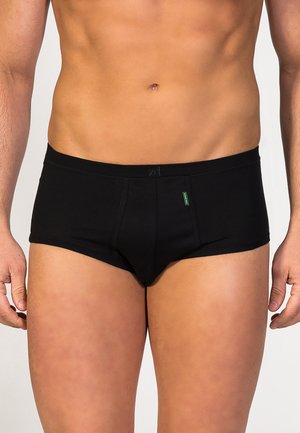 Schwarze Baumwoll-Boxershorts mit enger Passform, glatter Textur und einem kleinen grünen Logo am vorderen Bund.