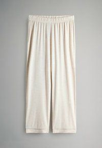 Light beige, knee-length pants with an elastic waistband. Made of soft, textured fabric with a subtle heather pattern. No pockets.