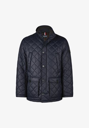 Men's navy blue quilted jacket with front snap buttons, two flap pockets, and zipper pockets, standing collar with button closure.