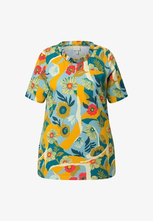 Koszula z krótkim rękawem z abstrakcyjnym wzorem kwiatowym w kolorach żółtym, morskim, niebieskim, czerwonym i kremowym na jasnoniebieskim tle.