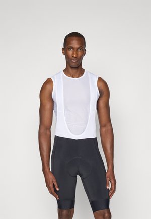 Le maillot de cyclisme présente un dessus en mesh blanc avec un col arrondi et des shorts noirs rembourrés intégrés. Tissu lisse avec une coupe ajustée.