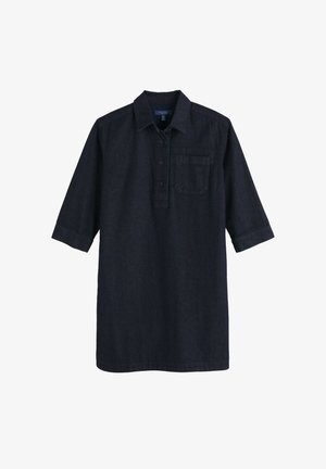 Tumesinise värvusega teksatuunika, millel on kraega kaelus, poolenisti nööbitav krae, üks rinnatasku ja kolmveerandtunnised varrukad.