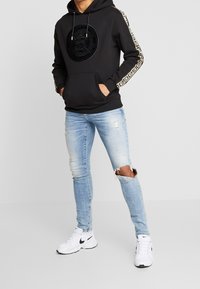 Glorious Gangsta Jersey con capucha - black