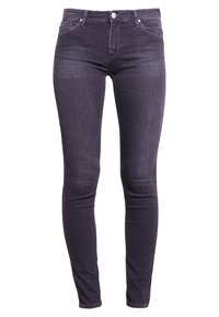 Chude dżinsy w ciemnoszarym denimu, z średnim stanem, pięcioma kieszeniami, subtelnym przeszyciem oraz metalowym zapięciem.