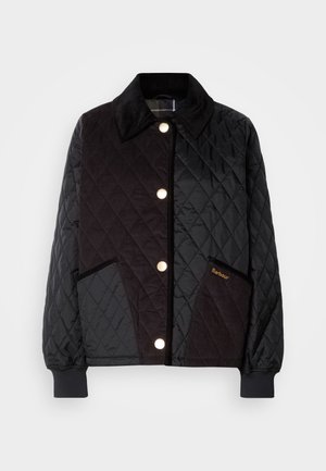 Black quilted jacket featuring a corduroy panel, gold snap buttons, side pockets, and ribbed cuffs. Brand name "Barbour" embroidered.