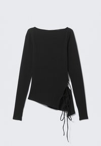Haut noir à manches longues avec un ourlet asymétrique et des liens latéraux. Confectionné dans un tissu doux, avec un large décolleté et une silhouette ajustée.