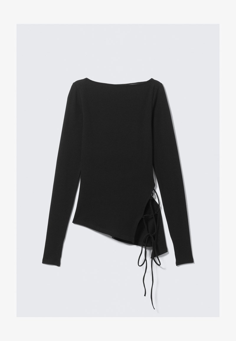 Haut noir à manches longues avec un ourlet asymétrique et des liens latéraux. Confectionné dans un tissu doux, avec un large décolleté et une silhouette ajustée.