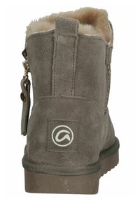 Grijze suède enkelboot met nepbontvoering, decoratieve rits en logo-patch op de hiel. Voorzien van een gestructureerde rubberen zool voor grip.