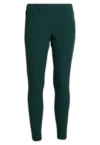 Pantalons verts extensibles avec une taille haute, des poches latérales et un design ajusté, fabriqués à partir d'un matériau lisse et doux.