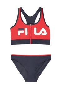 Rode en marineblauwe zwemtop met een ritssluiting aan de voorkant en een contrasterend wit logo, gecombineerd met een marineblauwe bikinionderbroek met een rode rand.