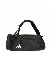 Sac de sport noir fabriqué en tissu durable, avec une fermeture éclair, une bandoulière ajustable et un logo blanc à trois bandes.