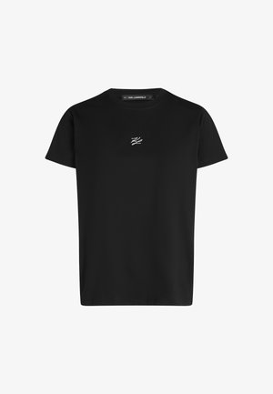 T-shirt de algodão preto com um corte clássico de pescoço redondo e mangas curtas. Apresenta um logótipo bordado em branco no peito. Textura suave.