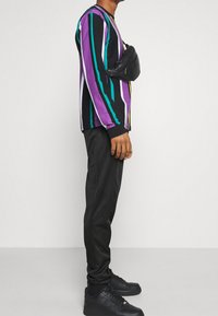 Ellesse Träningsbyxor - black