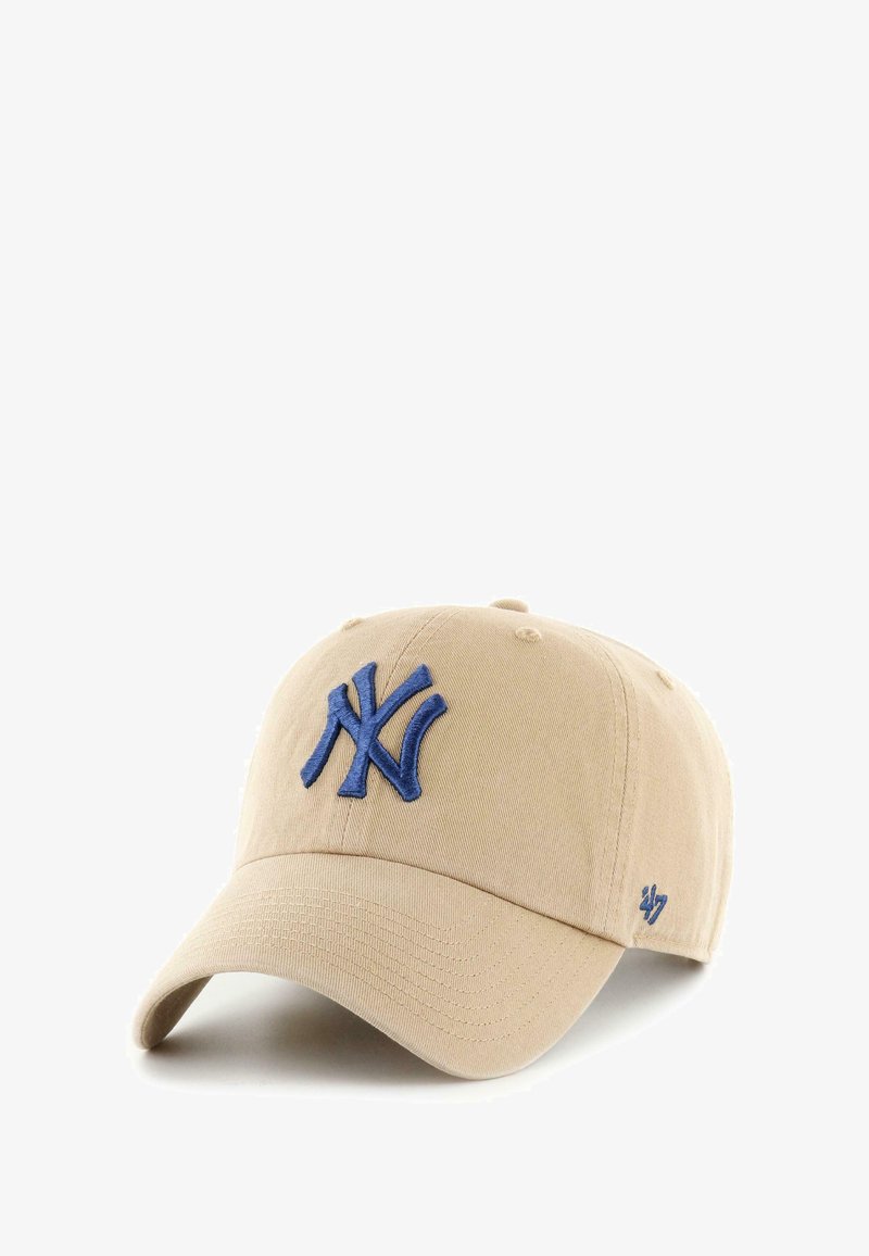 Baseball cap in beige cotton with a dark blue embroidered "NY" logo on the front and a small logo on the side. Curved brim design.