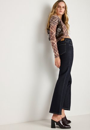 LOW FRONT SLIT - Jean flare - dark rinse